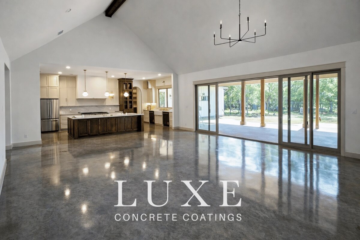 light grey stained concrete floor finish interior residential home by Luxe Concrete Coatings