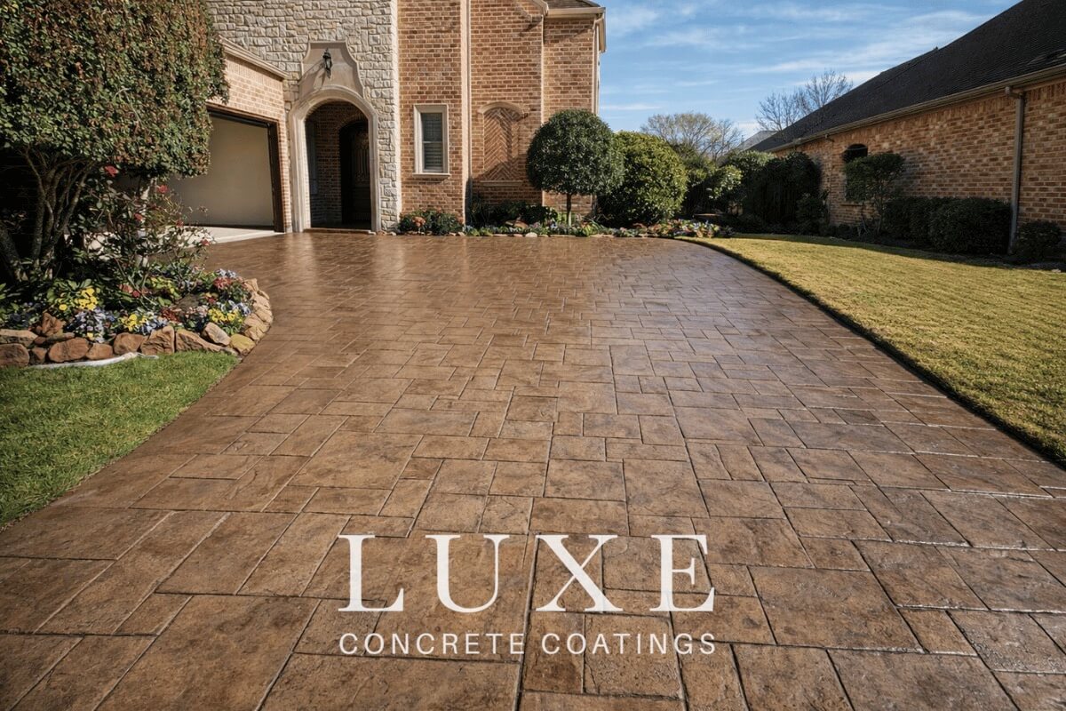 stained and sealed concrete stamped driveway residential exterior
