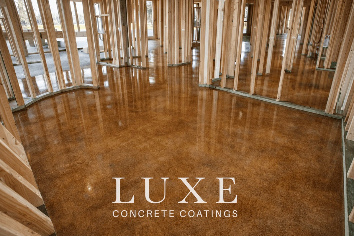 stained concrete finish installed on new home build by Luxe Concrete Coatings