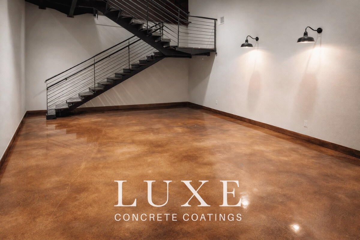 stained concrete interior living room flooring by Luxe Concrete Coatings